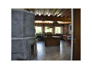 Gastraum der Pension Nanga Parbat mit Kachelofen
