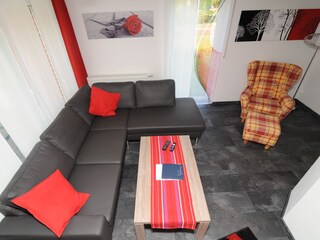 Wohnzimmer mit Ausgang zum Garten