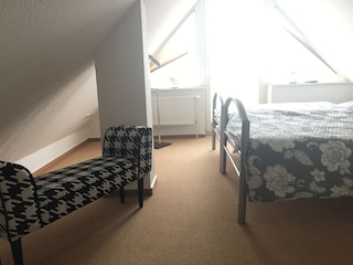 Schlafzimmer DG mit wunderschöner Aussicht auf Greetsie