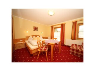 Dreibettzimmer