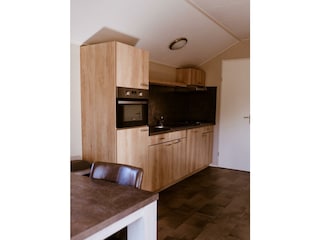 Kitchen with dishwasher and oven