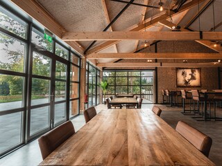 Group hall De Stal with large windows