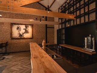 Wooden bar counter in De Stal