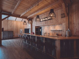 Bar with beer tap in the group room