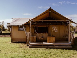 Glamping safari tent with wooden deck