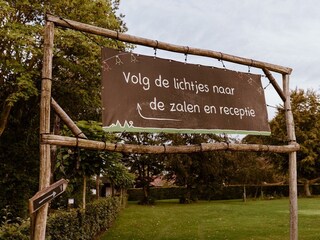 Sign to the halls and reception