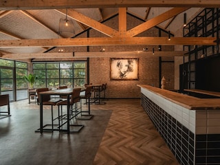 Wooden bar counter in De Stal