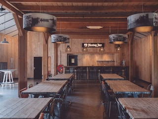 Group room with bar and long tables