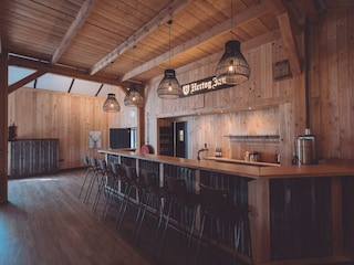 Bar with beer tap in the group room