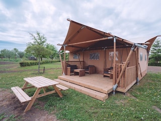 Glamping tent with picnic table