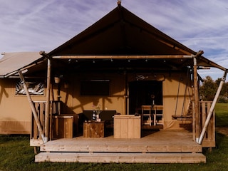 Glamping tent with outdoor kitchen