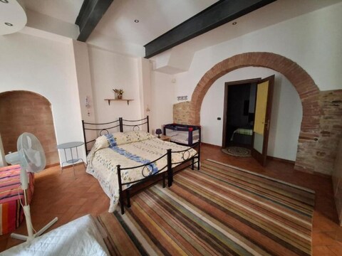 Appartement Gezellig appartement in een traditionele Toscaanse stenen boerderij.