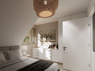 Helles, geräumiges Schlafzimmer mit TV - Beispielbild