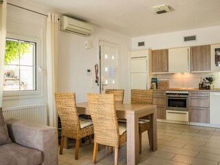 Villa Mandola - Apartment - Esszimmer mit Küche