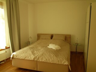 Double bed (180x200 cm) with two mattresses