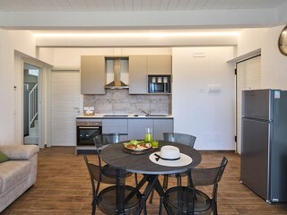 Villa Esther - Dining Table with Kitchen