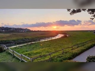 Sunset over the river Saâne, a few steps from the house