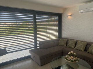 Holiday house Kastelir Living Room 23