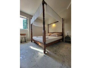 Schlafzimmer mit Himmelbett