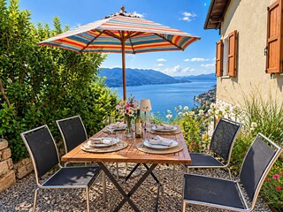 Ca. 10 m² große Terrasse mit traumhafter Panorama-See- und Bergsicht