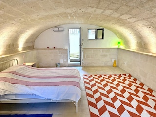 Schlafzimmer mit Ausgang zum