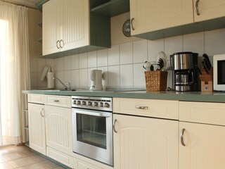 The modern fitted kitchen has all the necessities