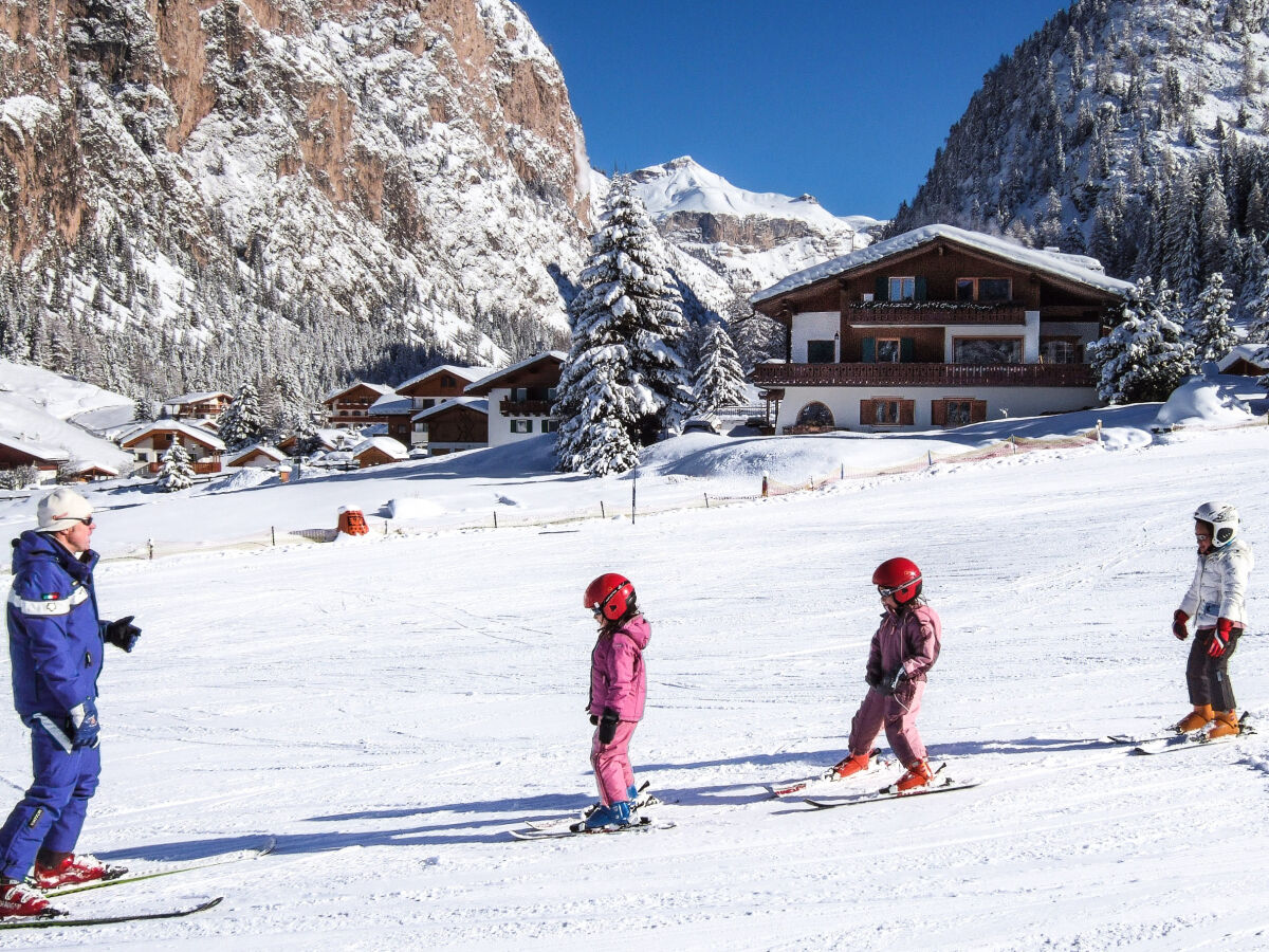 Ski school slope in front of the house