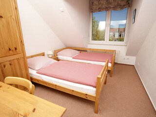 Schlafzimmer mit 2 Einzelbetten in der Ferienwohnung