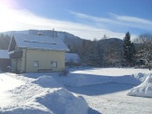 Winteransicht vom Ferienhaus Humer