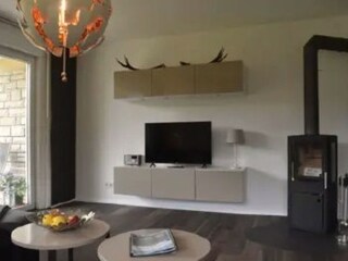 Wohnzimmer mit Kamin