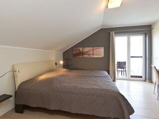 Schlafzimmer mit Dachterrasse