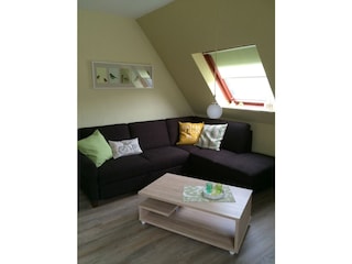 Wohnzimmer mit Schlafsofa