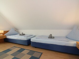 Bsp. Ferienhaus BUH 04 Schlafzimmer 2 OG