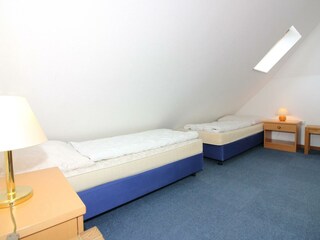 Bsp. Ferienhaus BUH 04 Schlafzimmer 3 DG