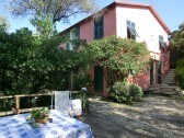 dine out on the deck in the shady garden at Casa Bosco