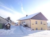 Ferienhaus im Winter