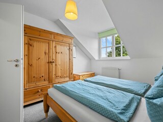 Schlafzimmer mit Ehebett