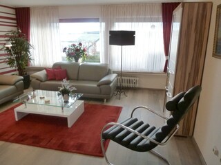 Wohnzimmer mit Relax Stuhl