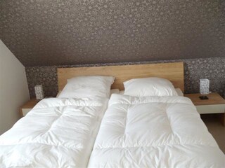 Schlafzimmer mit Doppelbett