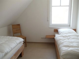 Schlafzimmer mit 2 Einzelbetten