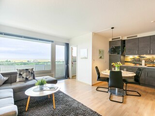 Wohnzimmer mit Meerblick und Küche