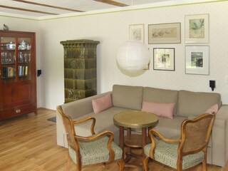 Living room with still usable Art Nouveau tile stove