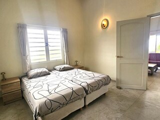 Master bedroom met airco en plafondventilator