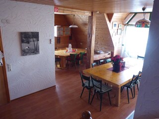 Living room with big and small dining table