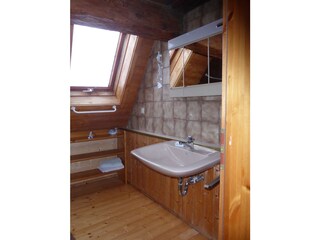 Shower and bath on the upper floor