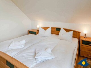 Schlafzimmer mit Doppelbett