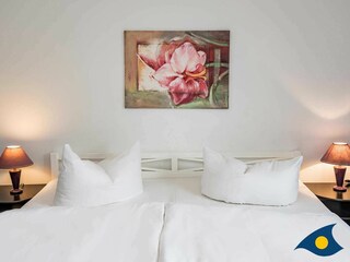 Schlafzimmer mit Doppelbett