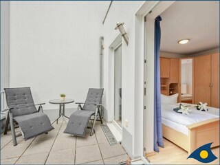 Schlafzimmer mit Balkon