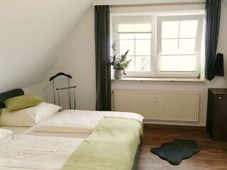 Schlafzimmer mit Doppelbett