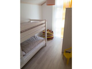 Kinderzimmer mit Hochbett